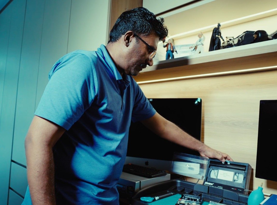 One captured B-roll screen capture of Mr Krishna Raj showing his work as his working area.