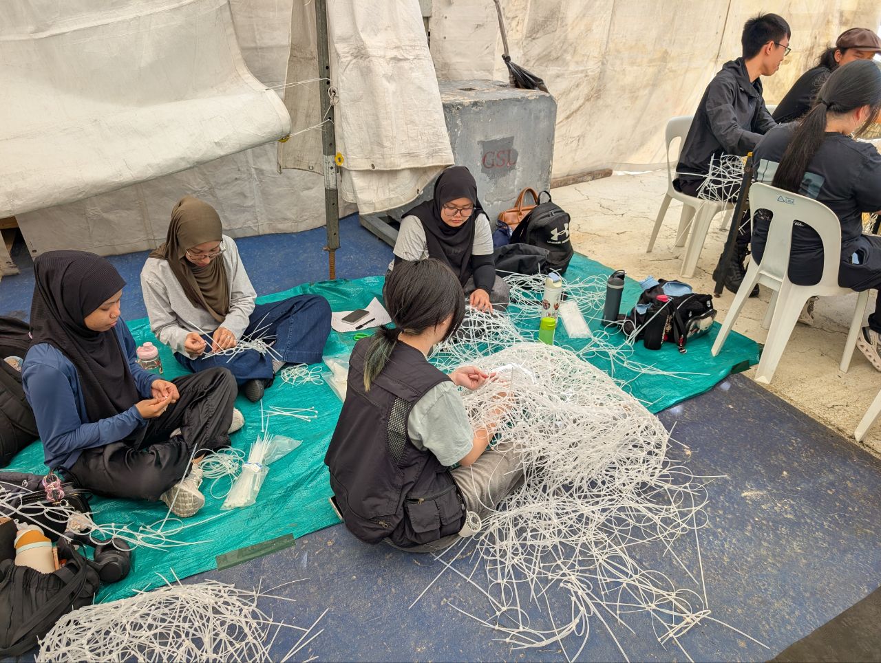 Construction of big zip-tie structures on-site at F1 Pit Building