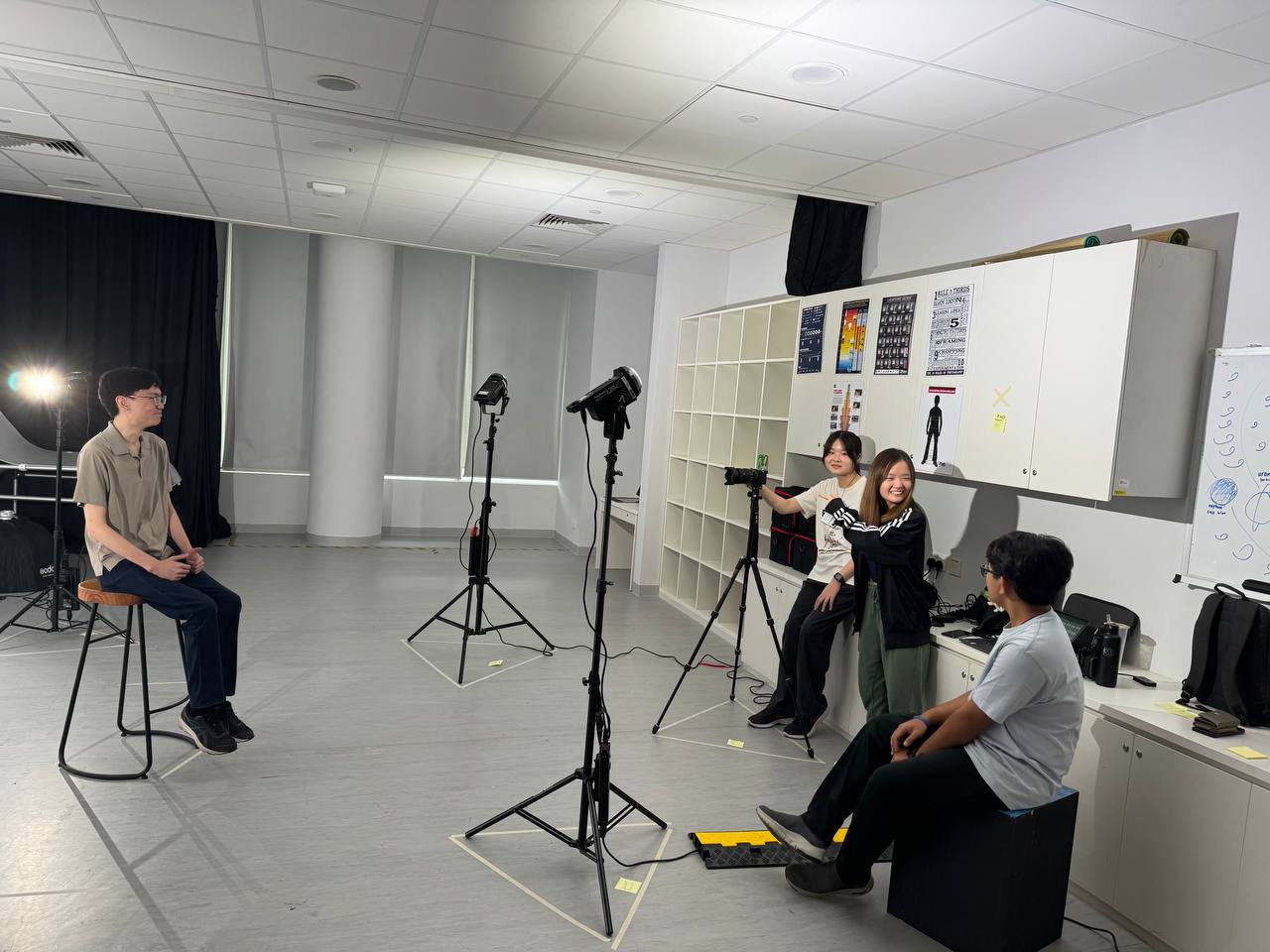<p data-start="55" data-end="275">This image shows some of the team members working behind the scenes during the photoshoot. It captures the effort and coordination required to organize and execute the visual content for the Symbiosis 2026 website.</p>