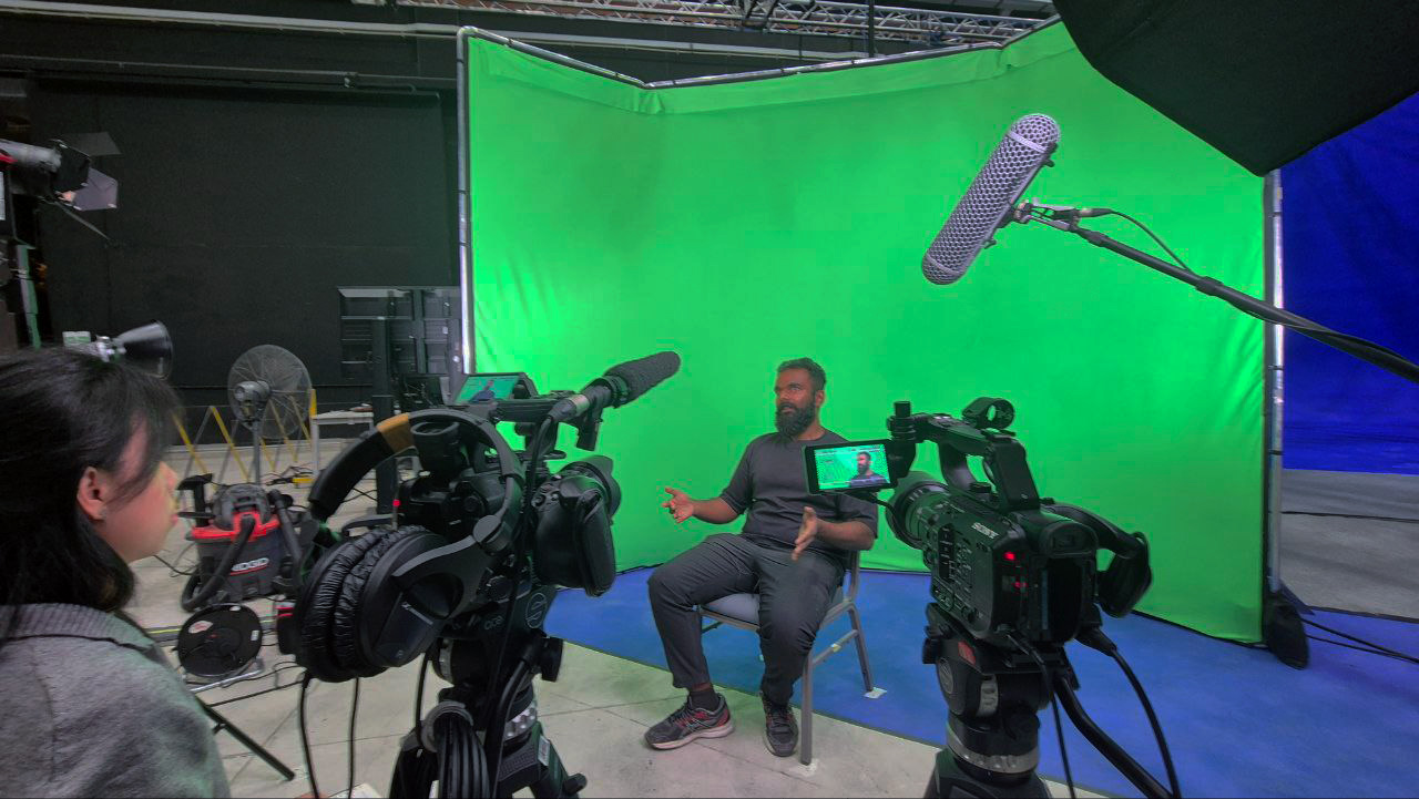 Behind the scenes — Filming the interview.