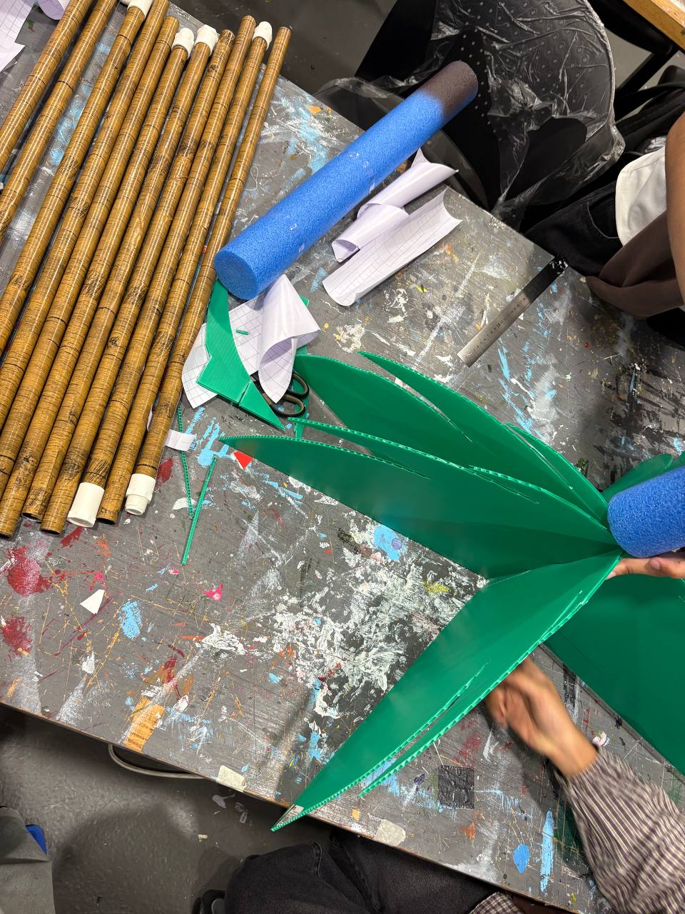 reconstructing our tree based off client's feedback to make it more stable
<ul>
 	<li>pool noodles added for stability</li>
 	<li>corrugated board replacing for the leaves</li>
</ul>