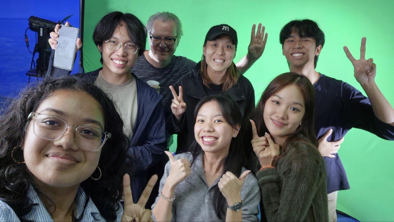 Final day of shoot — Group photo with our Director and Assistant Director.